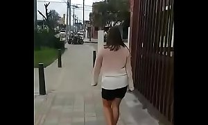Colombian puta walks barefoot in street for money