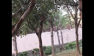 Indian couple kissing in park 1