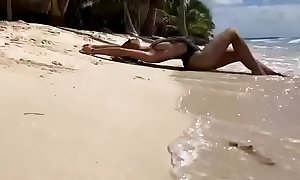 Escort girl Alisa playing on the beach