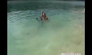 Dirty Lilly stripping of her Blue Bikini at the lake