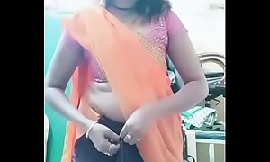 Swathi naidu sexy and romantic seducing in orange saree