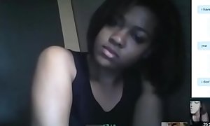 Sexy black girl shows tits and big ass for white dick on Skype